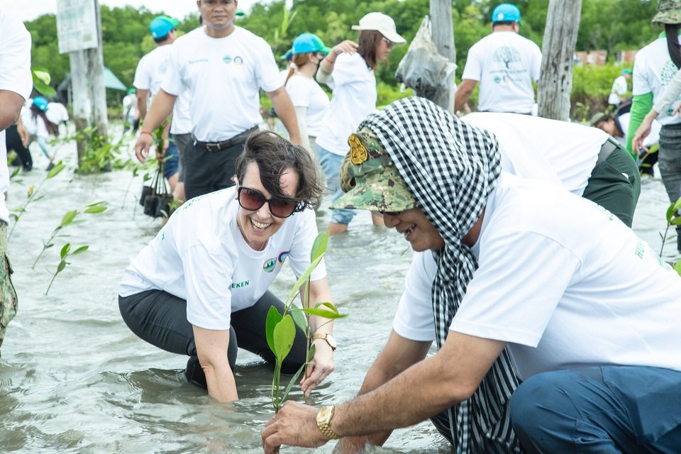 Activities of mangrove tree planning by His Excellency So Khanrithykun, Secretary of State for the Ministry of Environment and Ms. Anne Ollivier, Corporate Affairs Director at HEINEKEN Cambodia at the Trapaeng Sangkae community