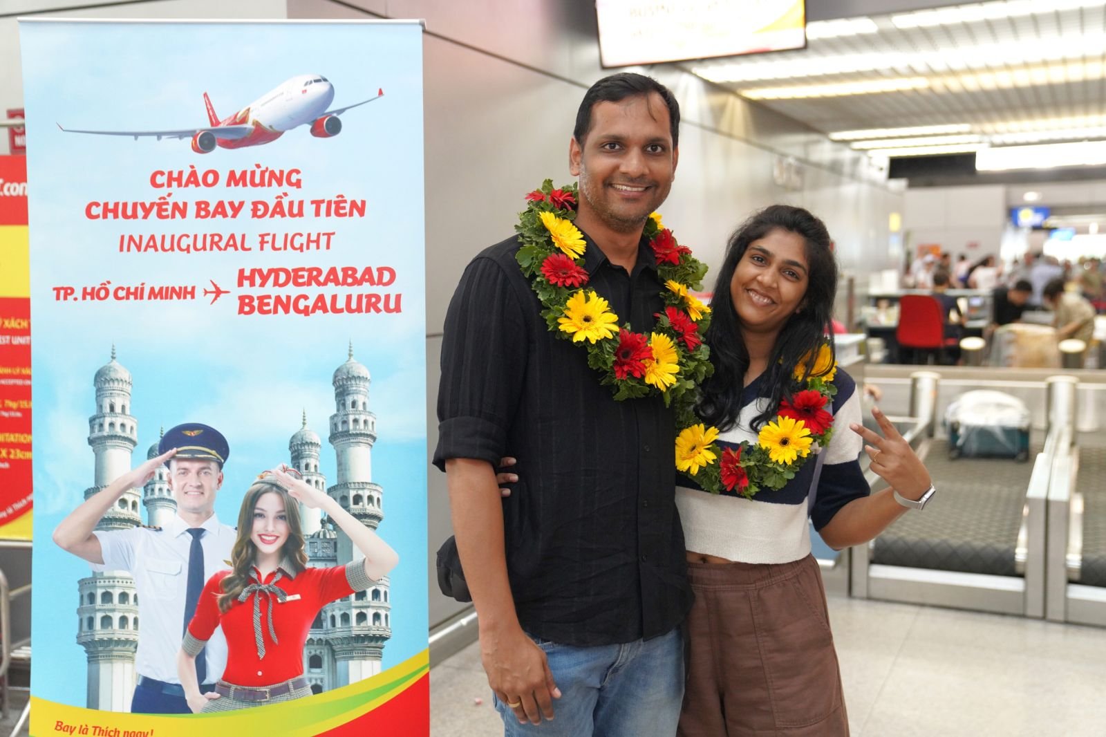 Passengers_check_in_for_the_inaugural_flight_from_Ho_Chi_Minh_City